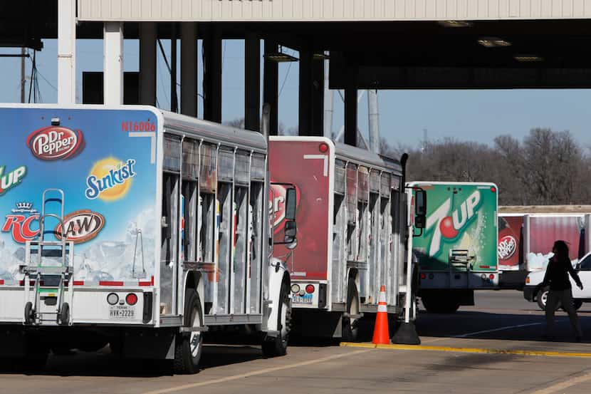 Trucks return to the Dr Pepper Snapple Group Bottling manufacturing and distribution...
