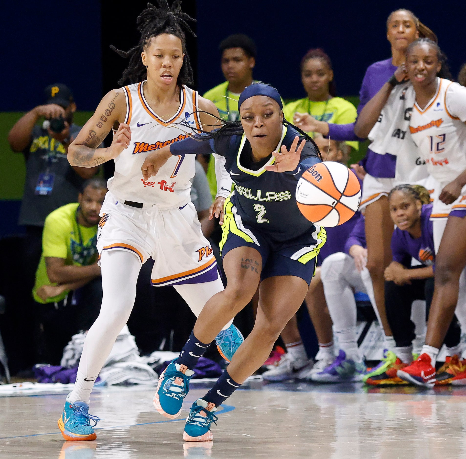 Dallas Wings guard Odyssey Sims (2) reaches for the ball that was knocked away by Phoenix...