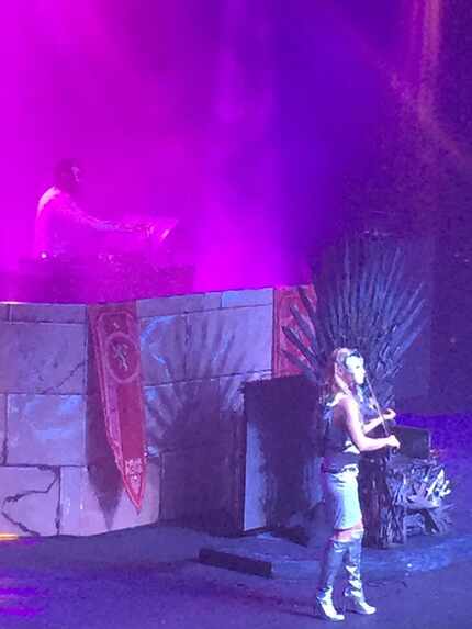 TheDJvsViolin perform by the Iron Throne (sorry, iPhone picture)