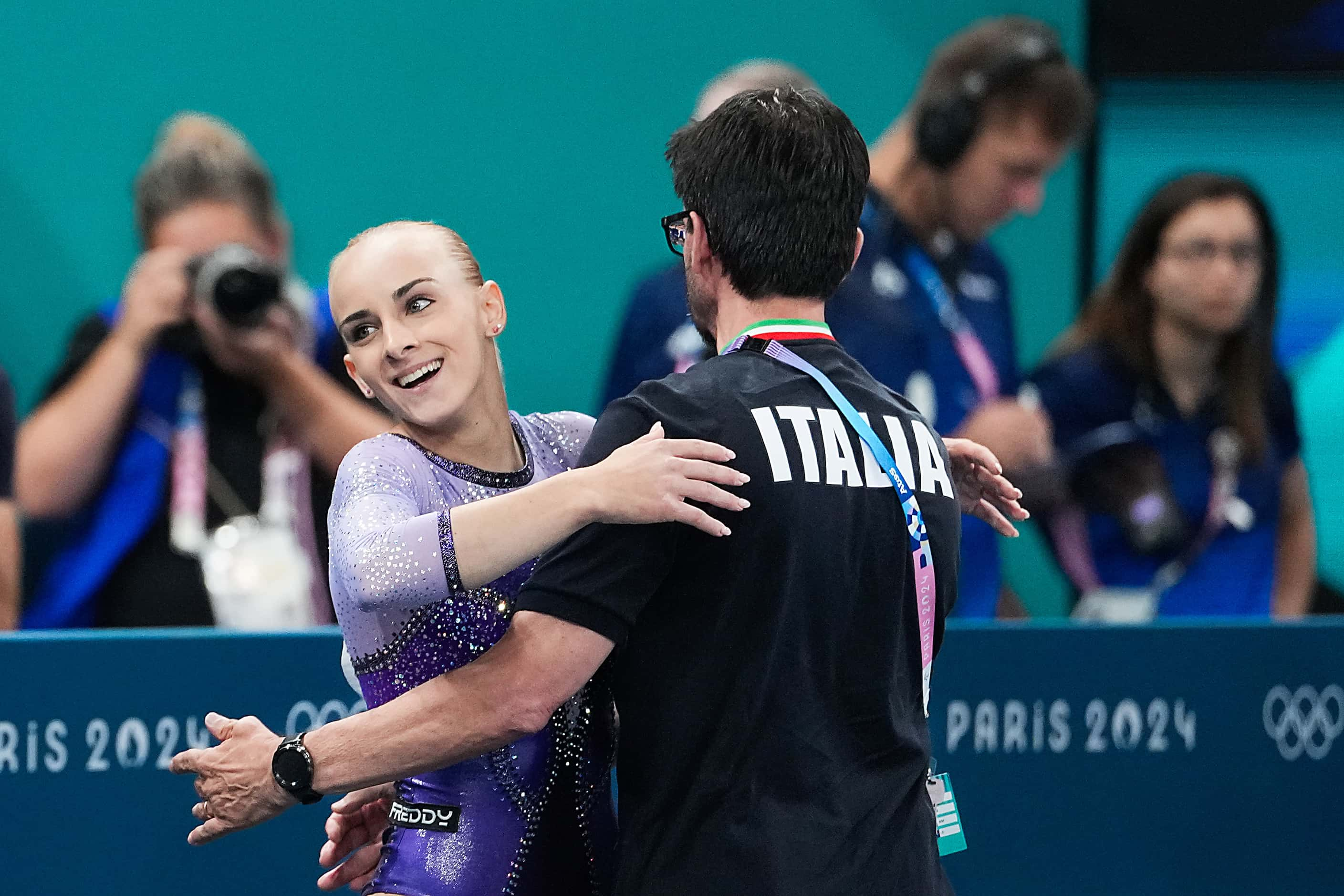 Gold medalist Alice D’Amato of Italy celebrates after her performance on the balance beam...