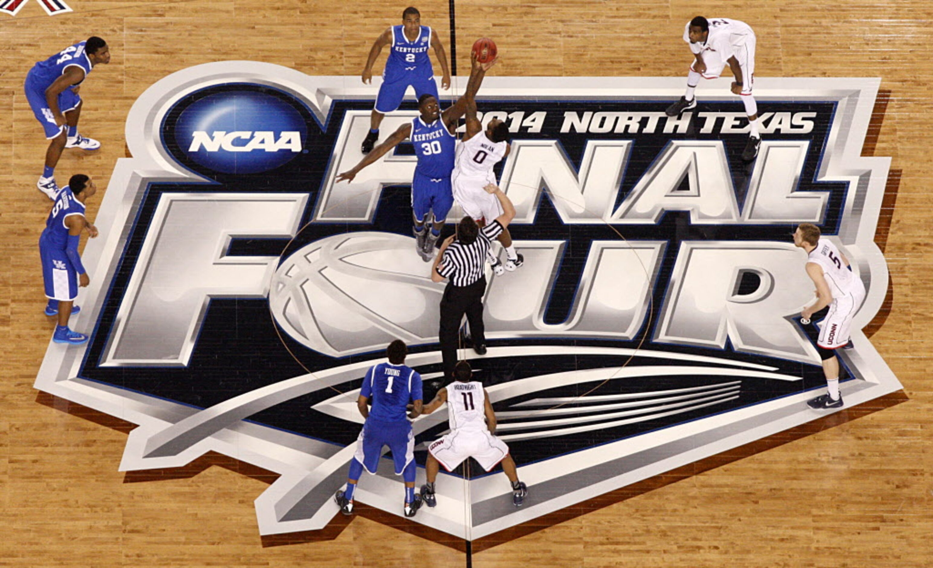 Kentucky Wildcats forward Julius Randle (30) of Dallas and Connecticut Huskies forward...