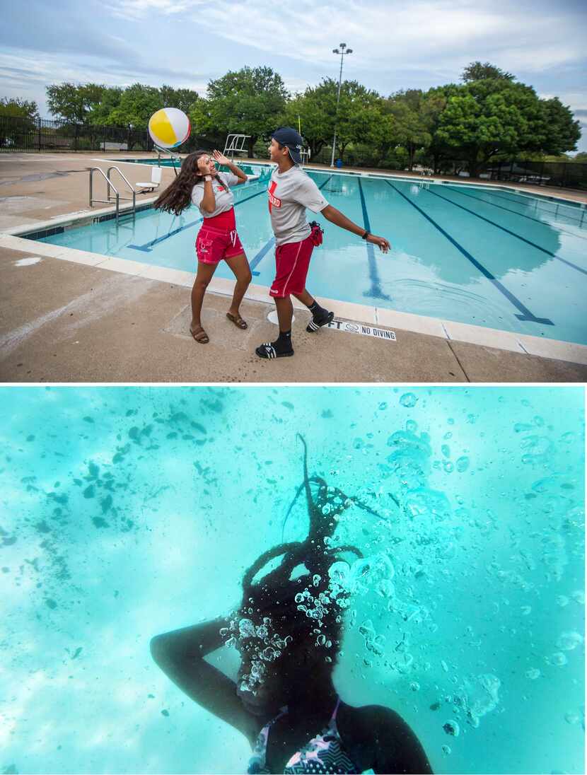 Over/under: (top) Lifeguards Liz Vasquez and Moises Zambrano play with a beach ball on a...