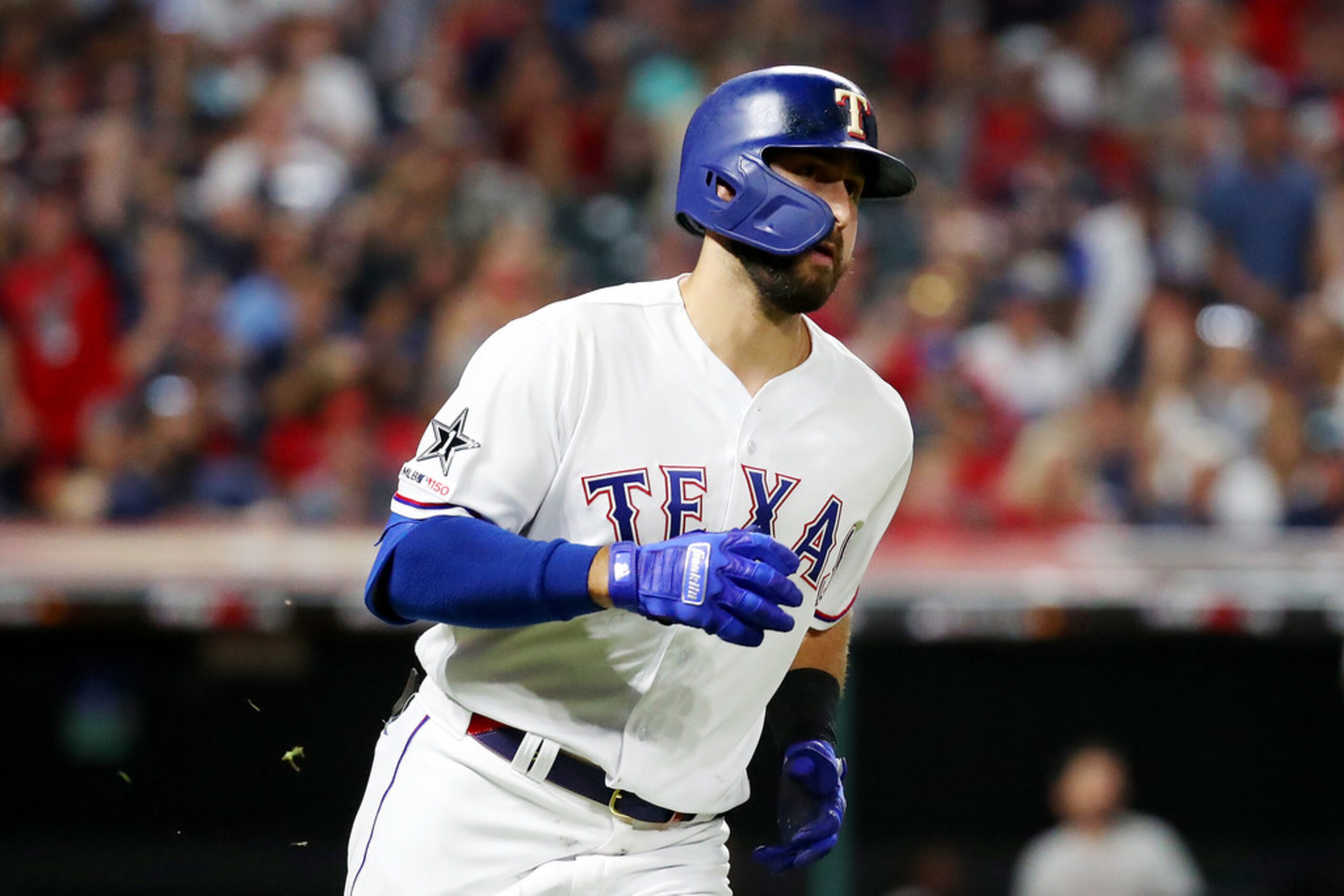 CLEVELAND, OHIO - JULY 09: Joey Gallo #13 of the Texas Rangers and the American League runs...