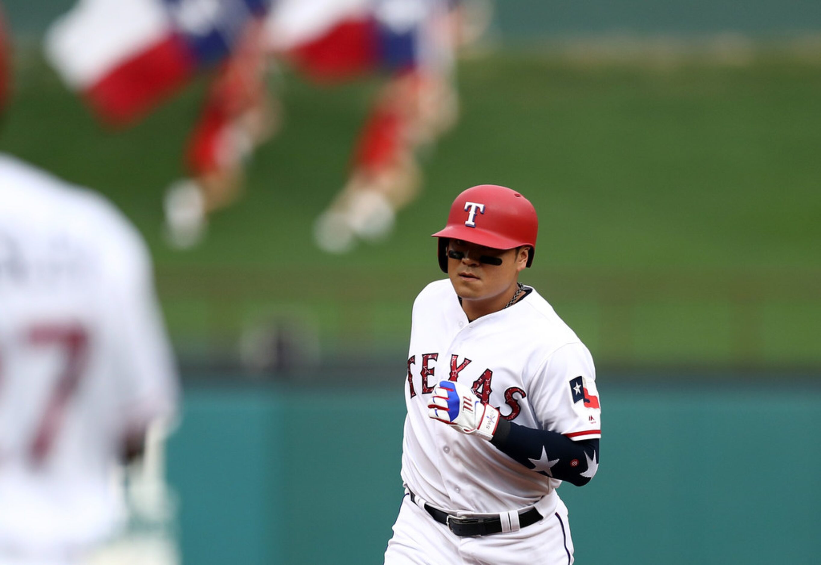 ARLINGTON, TX - JULY 04:  Shin-Soo Choo #17 of the Texas Rangers runs the bases after...