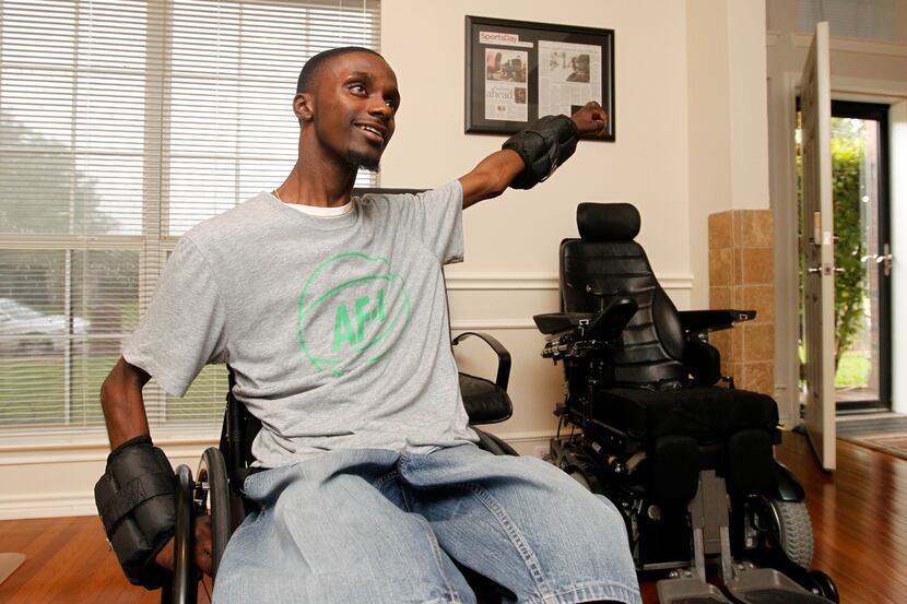 Corey Borner exercises with weight on his wrists at his home in DeSoto, TX on May 15, 2013....
