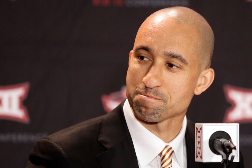 Texas coach Shaka Smart waits for questions during the Big 12 conference NCAA college...