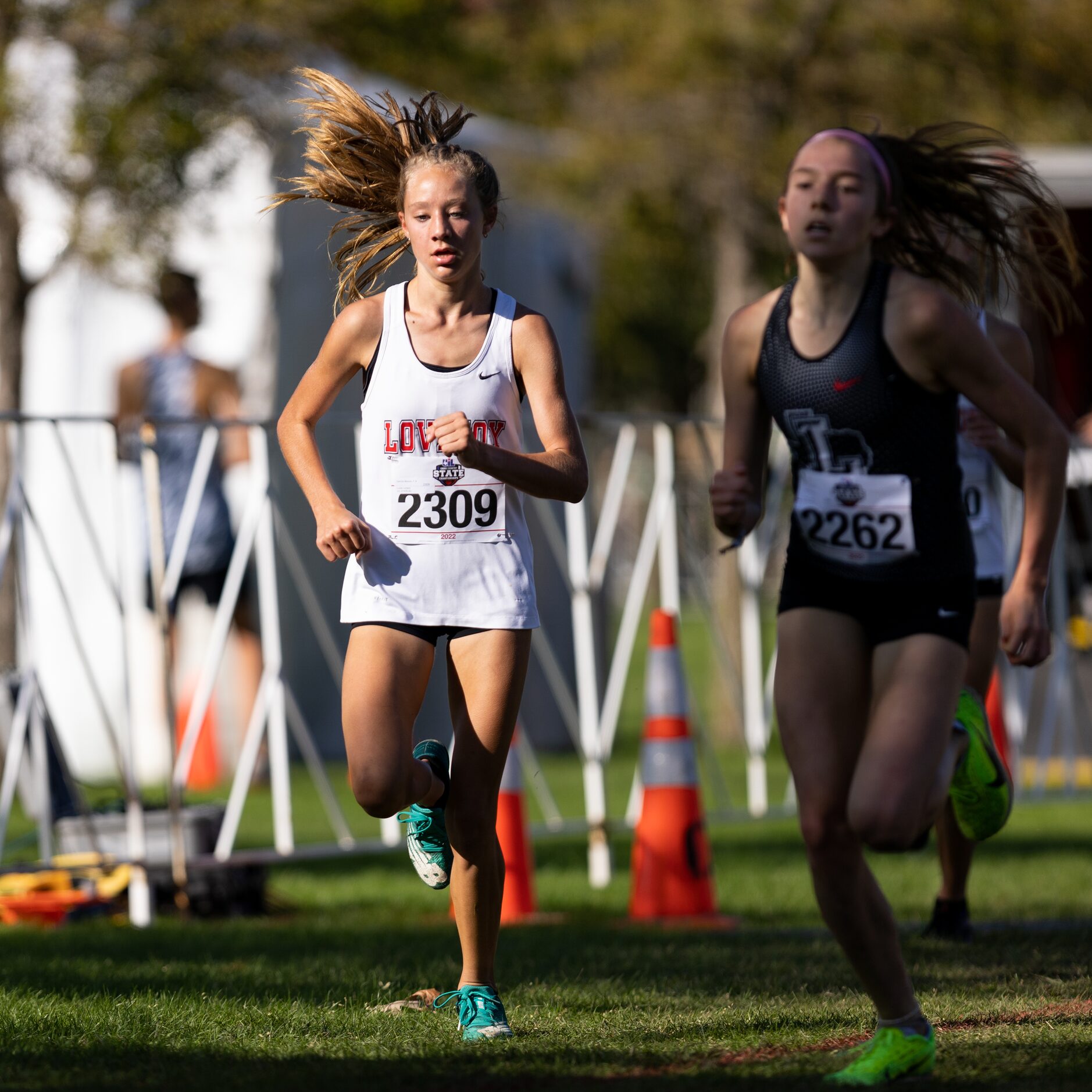 Camryn Benson of the Lovejoy Leopards runs toward the finish in the 5A girls' 3200m race...