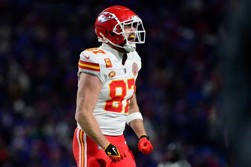 Kansas City Chiefs tight end Travis Kelce (87) reacts after defeating the Buffalo Bills in...