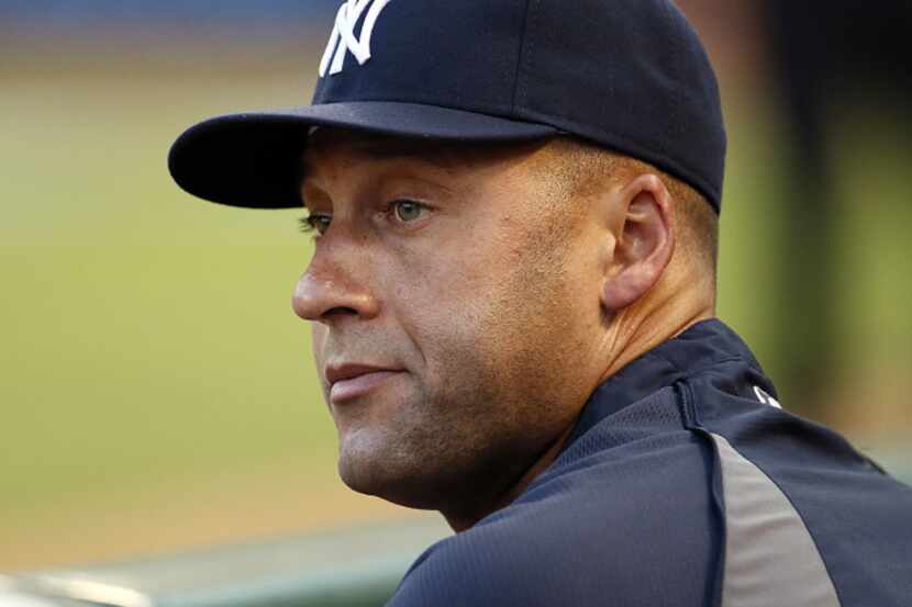 The New York Yankees shortstop Derek Jeter (2) was on the disabled list but was on hand to...