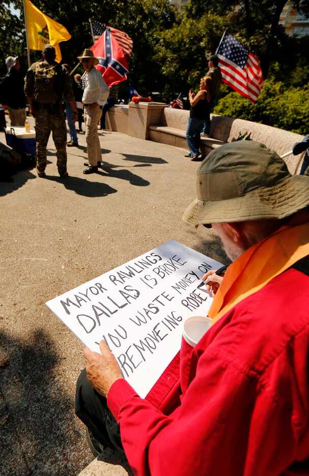 James Murphy of Red Oak created a protest sign last month before the This Is Texas Freedom...