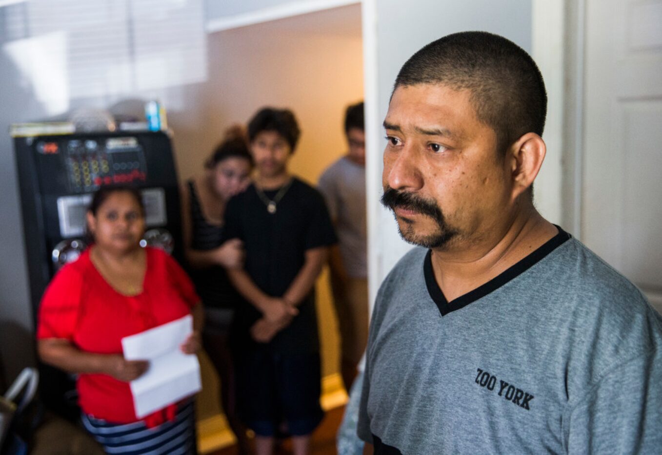 Jose Palma talks about his family's home in July in Dallas. The Palmas had learned that the...