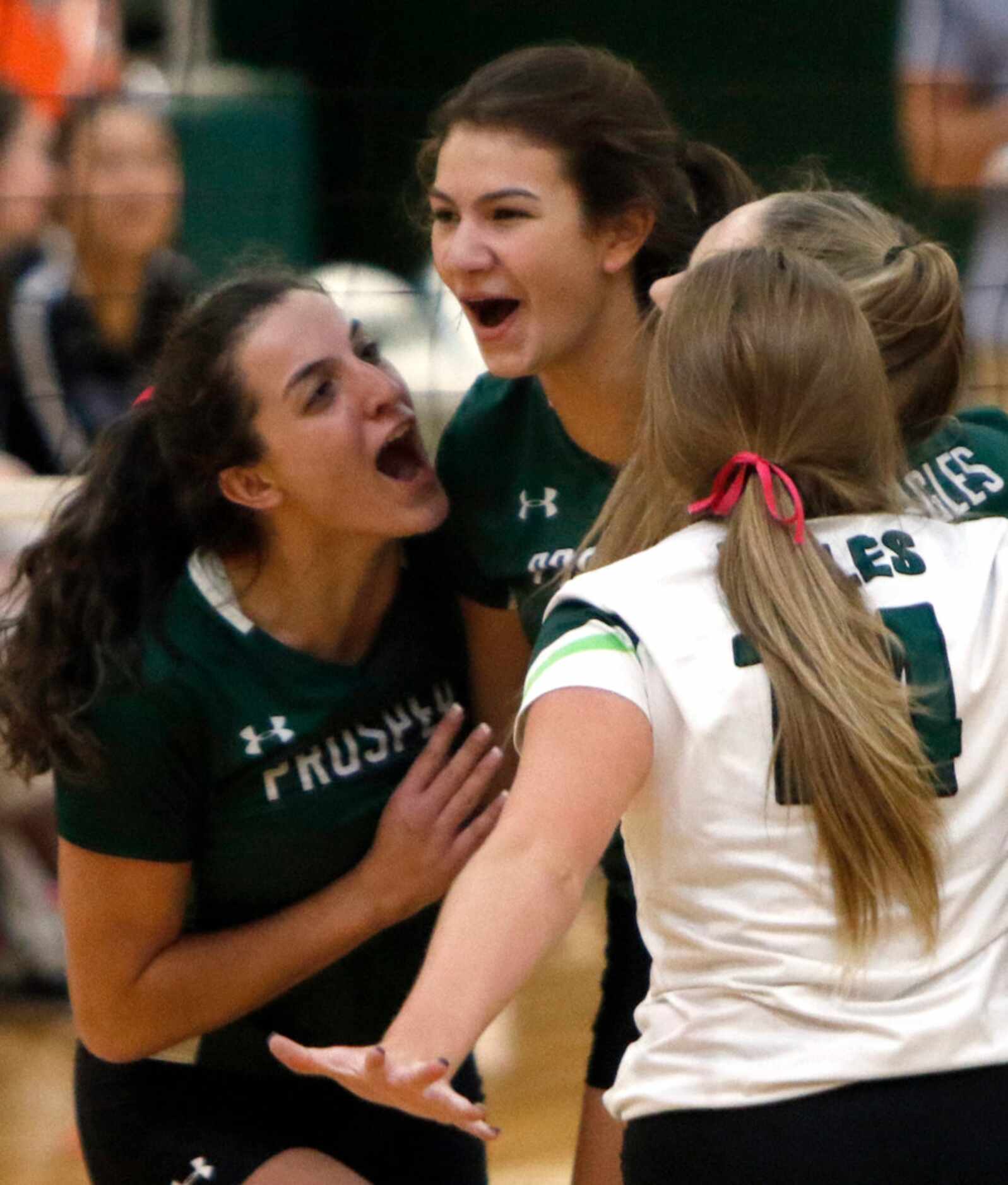 Prosper's Taylor Youtsey (16), center, was all smiles as she celebrates with teammate Sami...