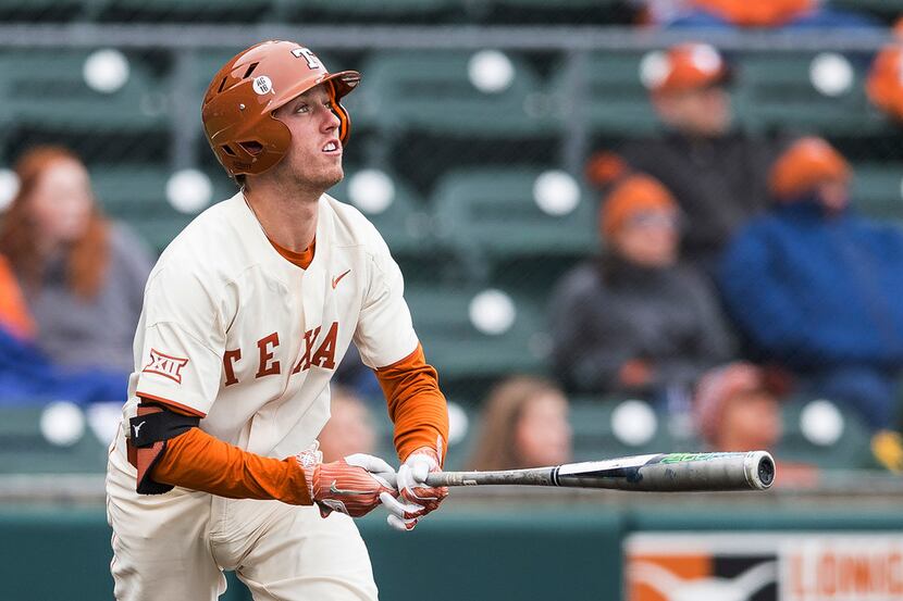 FILE - In this April 7, 2018, file photo, Texas' Kody Clemens (2) watches his home run...