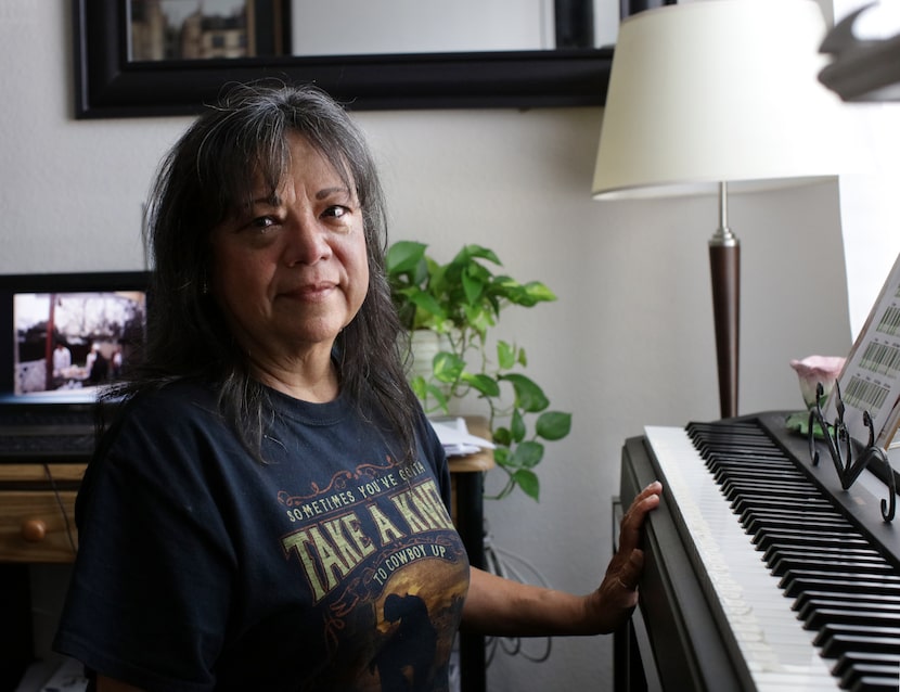 Teresita Gonzales with her son's belongings at her home in Frisco on Jul 25, 2022.  Teresita...