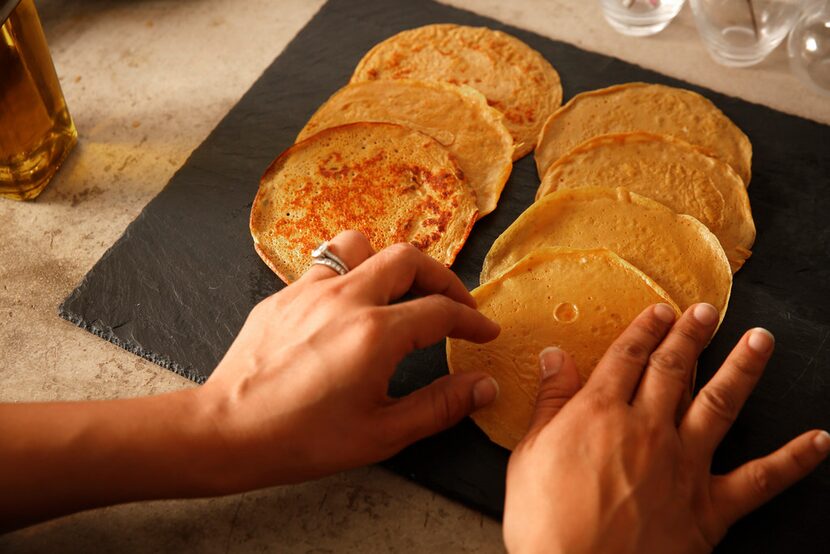 Chef Soraya Spencer, owner of Gather Kitchen, makes crepe tacos at her home in Dallas.