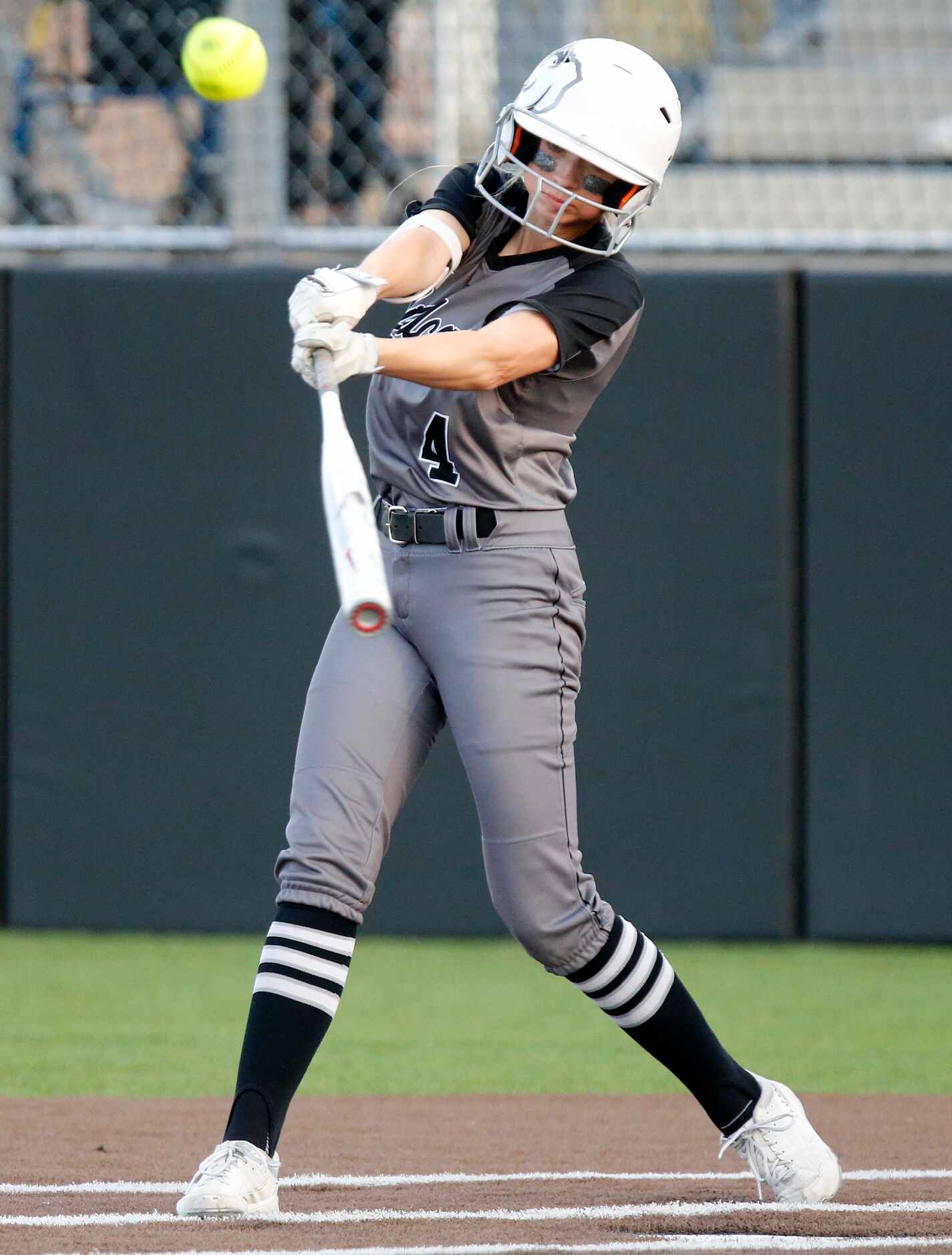 Denton Guyer High School third baseman Erin Peterson (4) pops up in the first inning as...