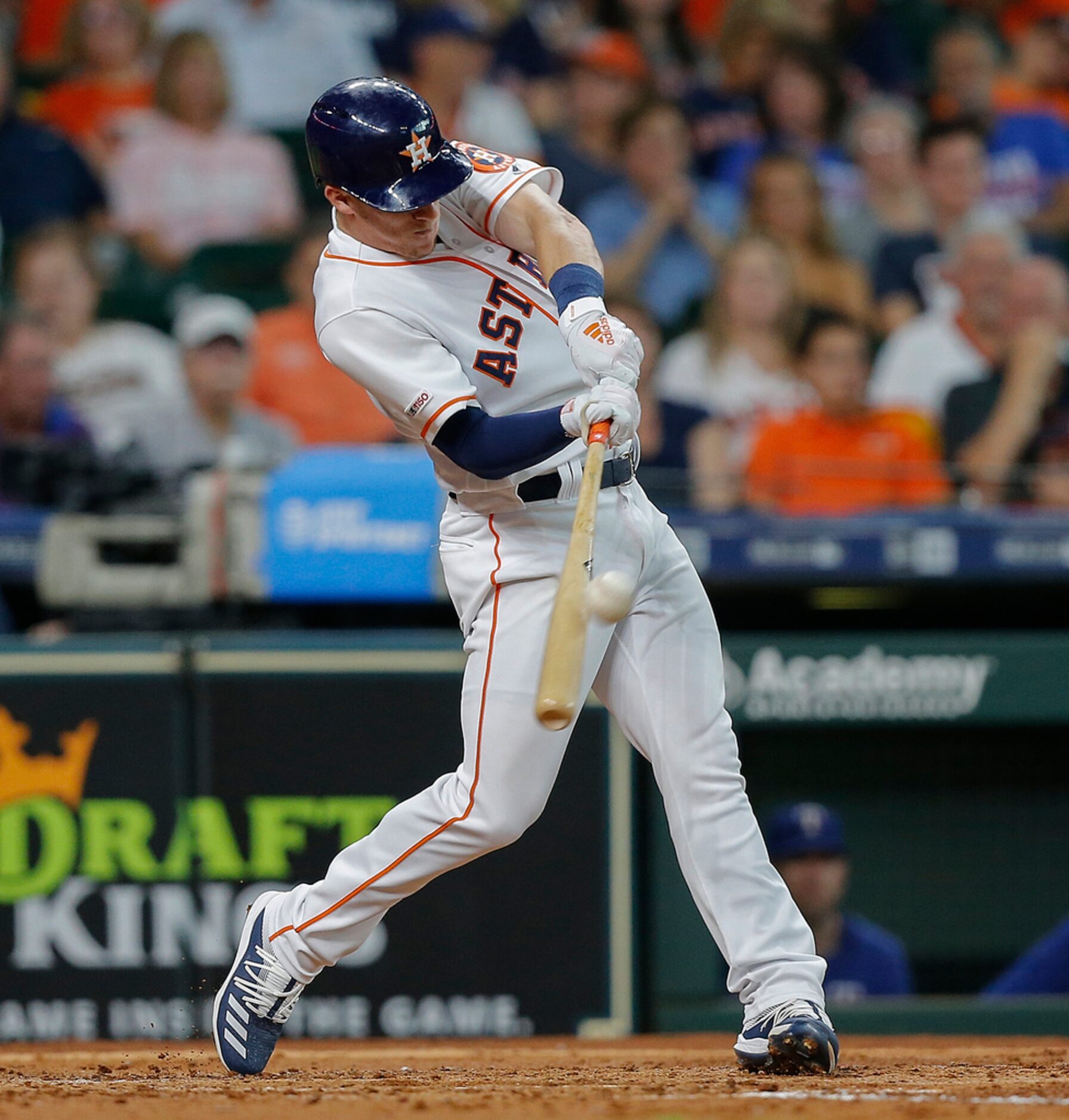 HOUSTON, TEXAS - JULY 20: Myles Straw #26 of the Houston Astros doubles in the third inning...