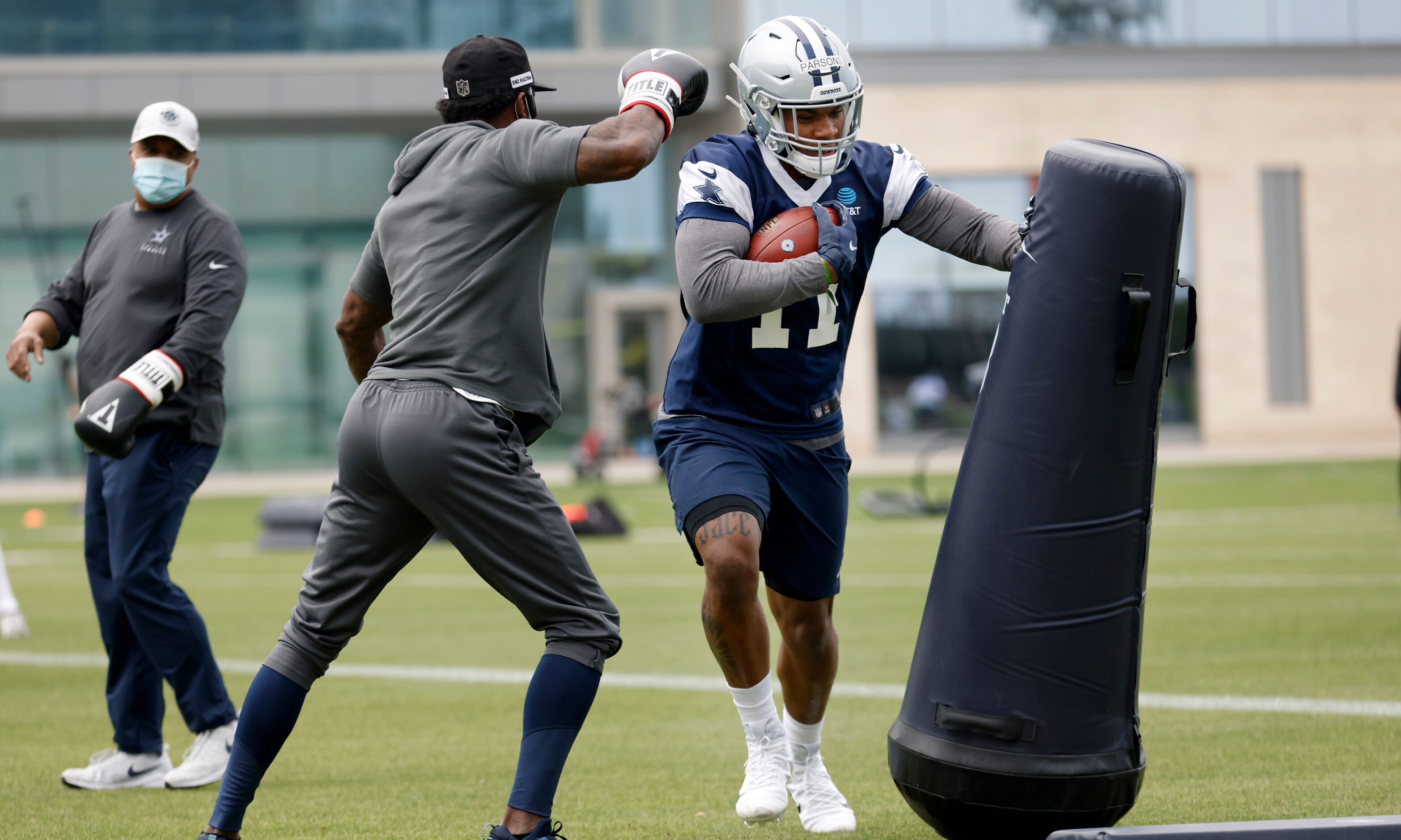 Dallas Cowboys rookie linebacker Micah Parsons (11) runs through drills during rookie...