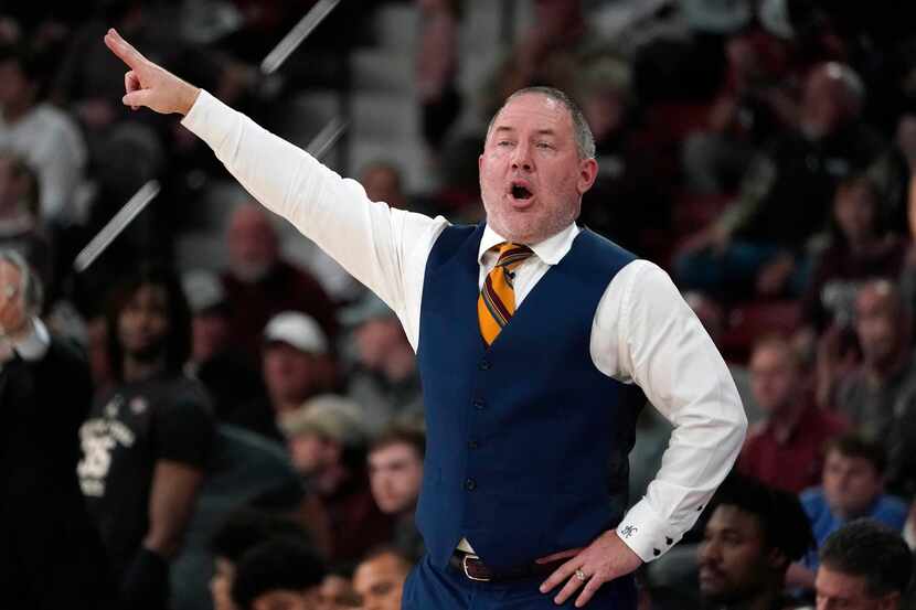 Texas A&M head coach Buzz Williams signals to his players during the second half of an NCAA...