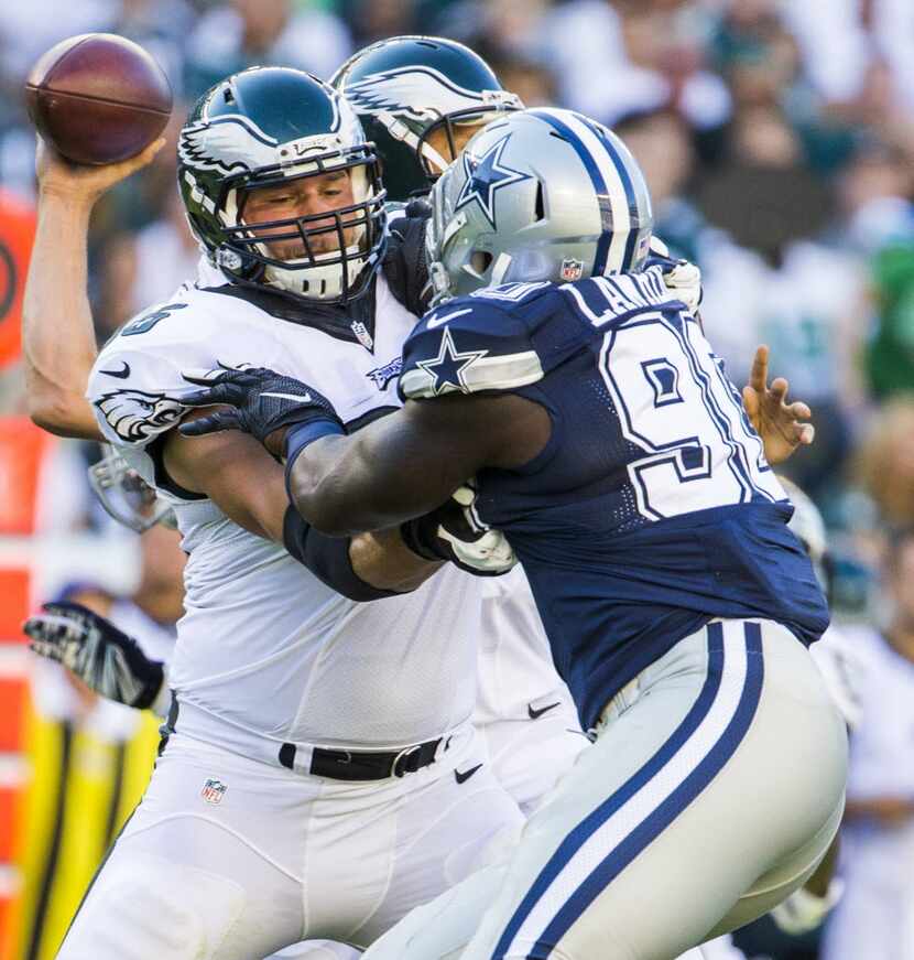 Dallas Cowboys defensive end Demarcus Lawrence (90) is blocked by Philadelphia Eagles tackle...