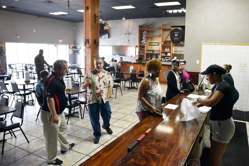 The main counter and dining room inside Winners BBQ in Plano.