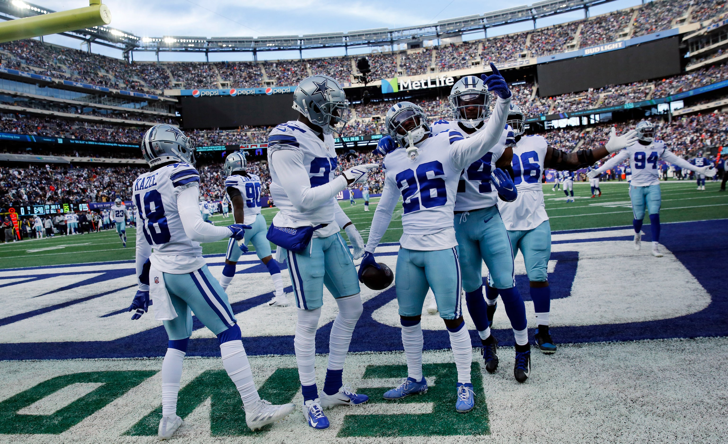 Dallas Cowboys cornerback Jourdan Lewis (26) celebrates his first quarter interception with...