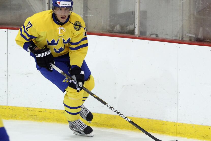 LAKE PLACID, NY - AUGUST 08: Patrik Nemeth #12 of Team Sweden skates against Team USA at the...