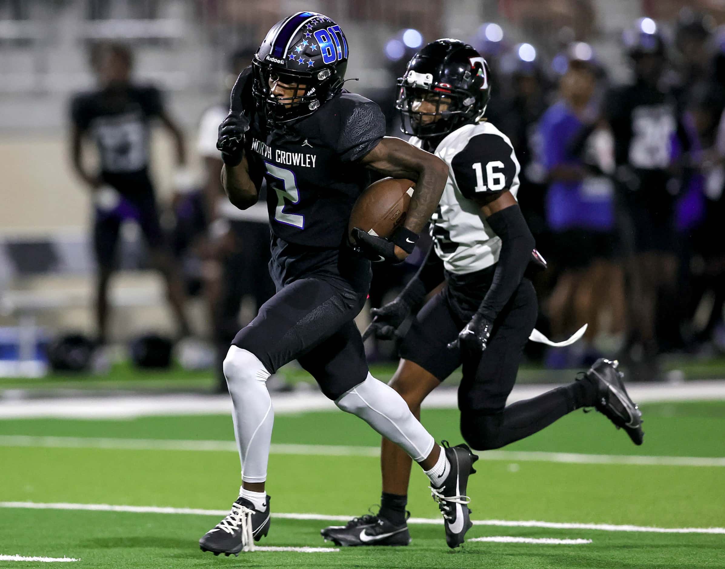North Crowley wide receiver Mason Ferguson (2) gets past Euless Trinity defensive back...