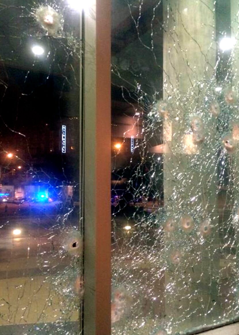 Windows at   Dallas Police Department headquarters were shot out in the incident early...