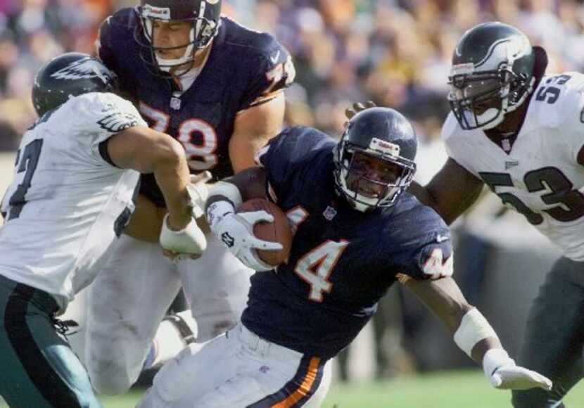 Chicago Bears running back Curtis Enis (44) is tackled after a 4-yard gain by Philadelphia...