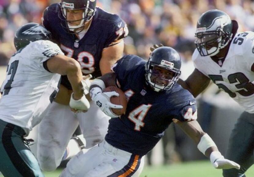 Chicago Bears running back Curtis Enis (44) is tackled after a 4-yard gain by Philadelphia...