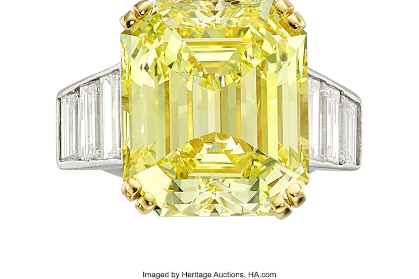 Heritage Auctions sold this fancy intense yellow diamond ring from the jewelry collection of...