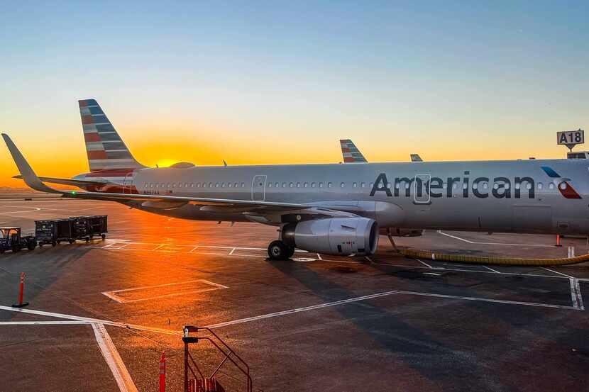 American Airlines planes parked in terminal A at the DFW International Airport on Tuesday,...