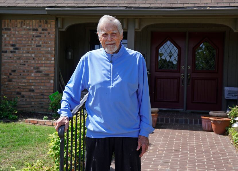 Eddie Robinson stands on the front steps of his home in Fort Worth. He is the oldest living...