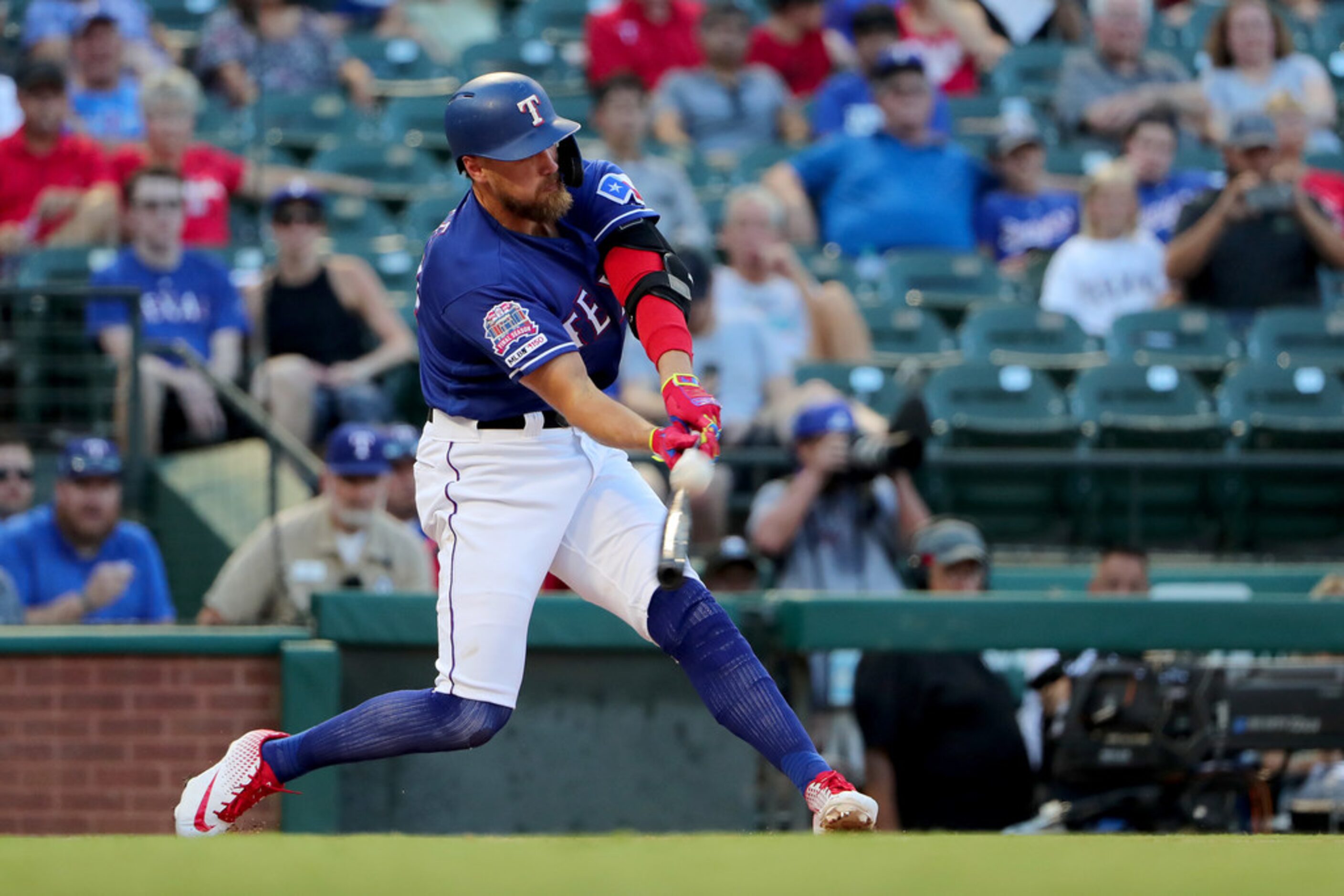 ARLINGTON, TEXAS - JULY 16: Hunter Pence #24 of the Texas Rangers hits a fly ball against...