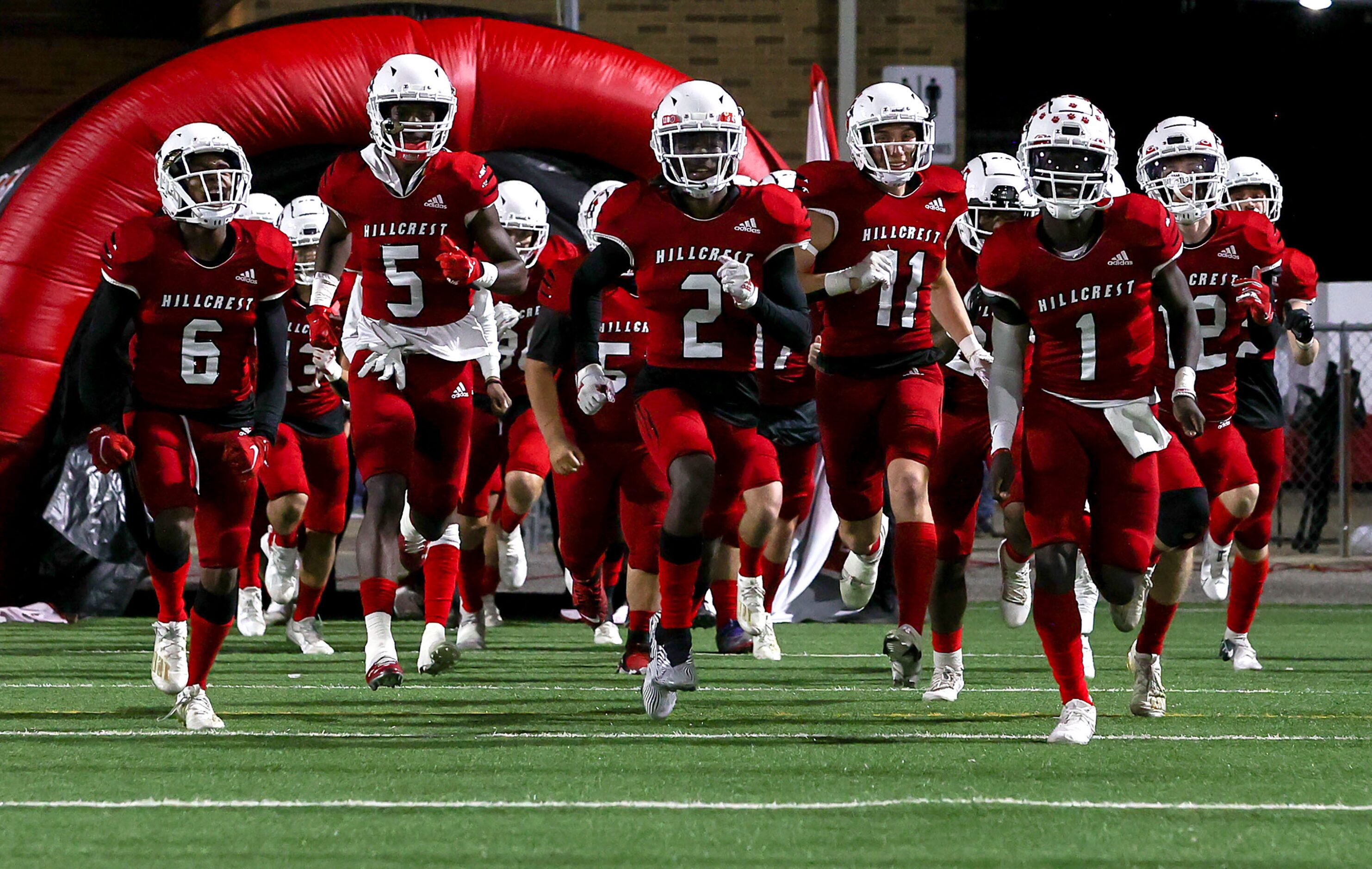 The Hillcrest Panthers enter the field to face Spruce in a District 6-5A high school...