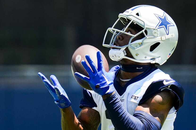 Dallas Cowboys wide receiver Brandin Cooks (3) catches a pass during a training camp...