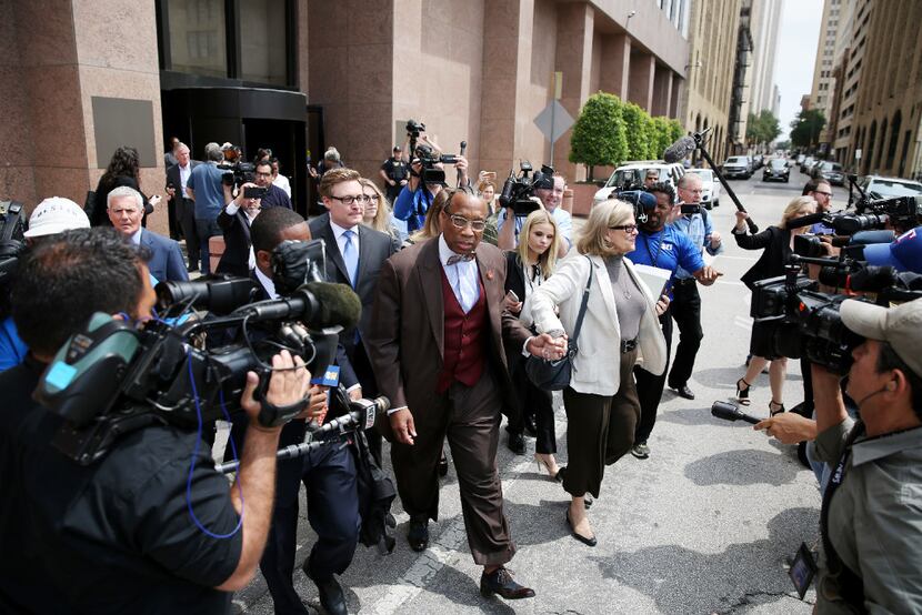 Dallas County commissioner John Wiley Price walks out of the the Earle Cabell Federal...