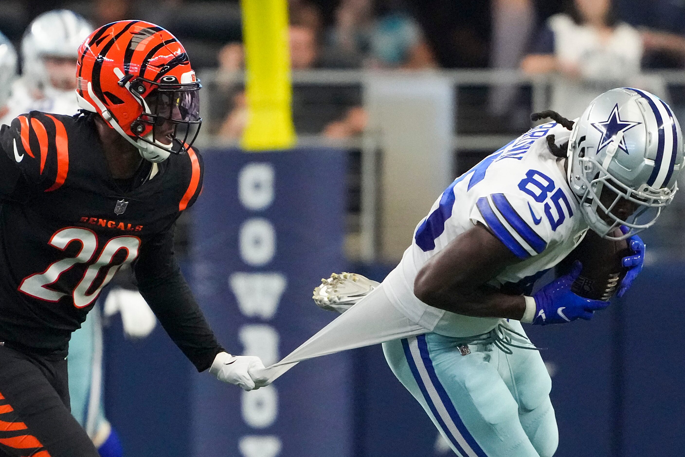 Dallas Cowboys wide receiver Noah Brown (85) hauls in a pass as Cincinnati Bengals...