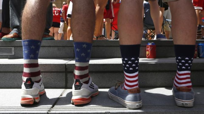 
U.S. backers show their true colors at the watch party at Victory Plaza. Soccer is gaining...