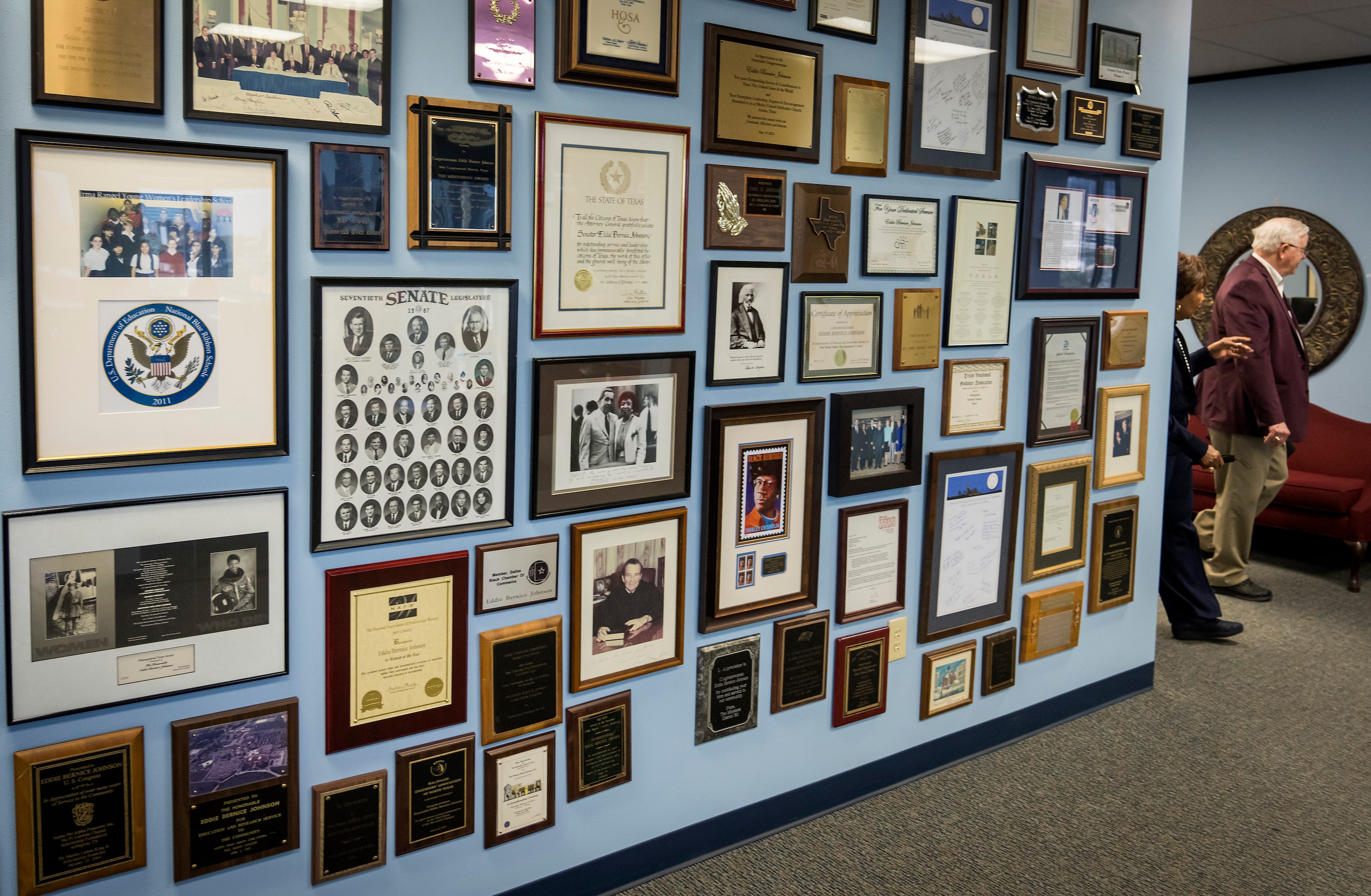 Rep. Eddie Bernice Johnson points gives a tour of her office to former Rep. Joe Barton on...