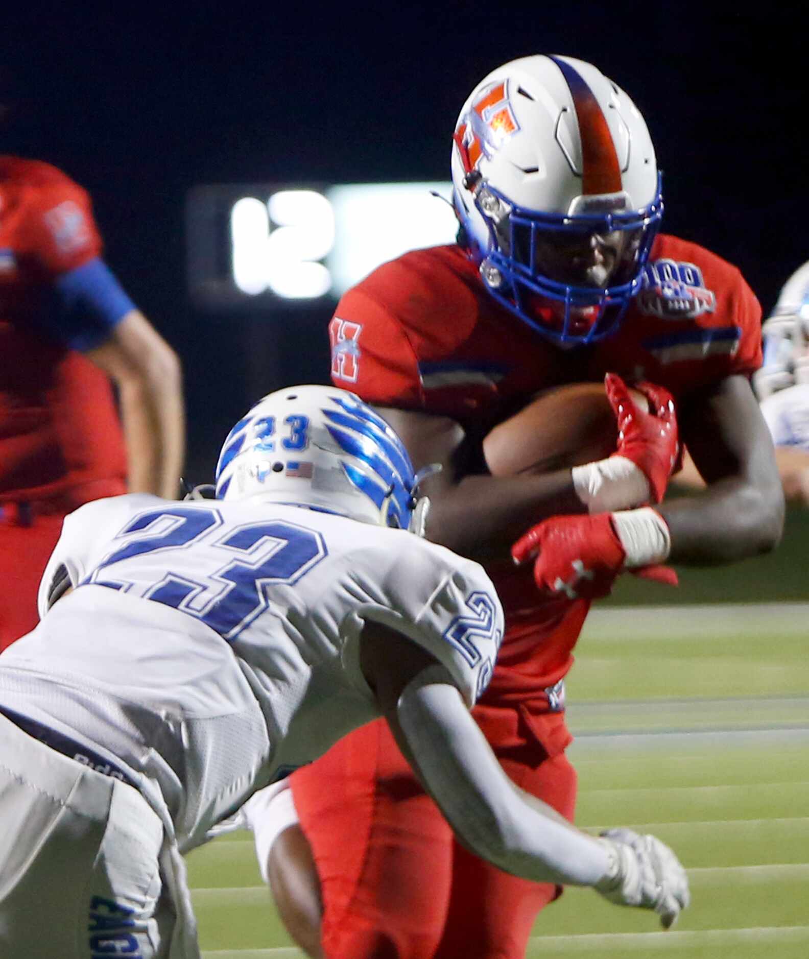 Midlothian Heritage running back Latray Miller (28) bolts past the defense of Lindale...