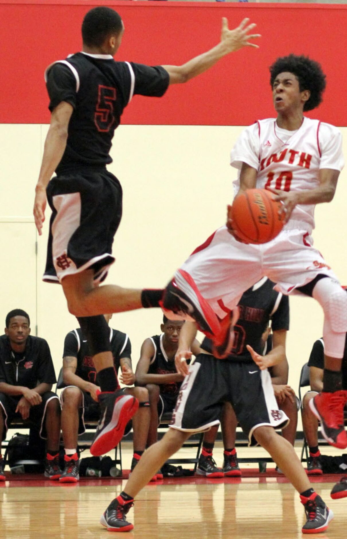 South Grand Prairie guard Maverick Ramirez (10) flies to the basket as  Cedar Hill guard...