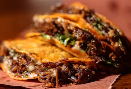 The small, a la carte taco menu at El Taco H in Denton includes quesabirria tacos loaded...