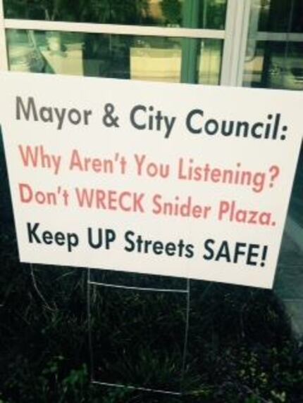 Residents posted signs around University Park urging their elected officials to vote against...