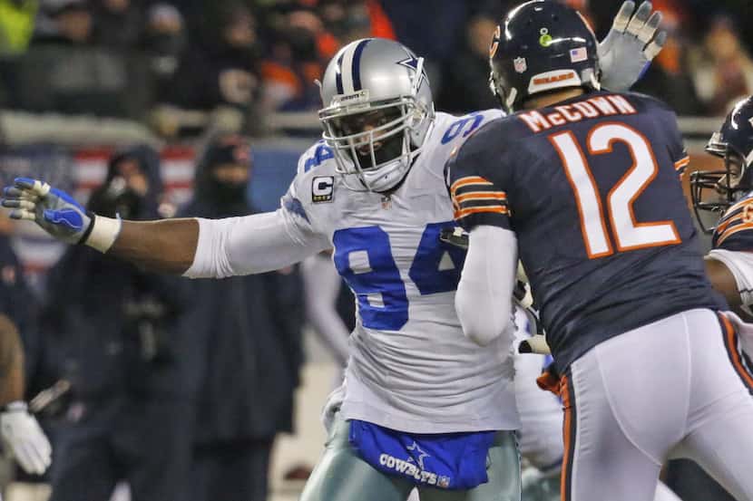 Dallas Cowboys defensive end DeMarcus Ware (94) rushes Chicago Bears quarterback Josh McCown...