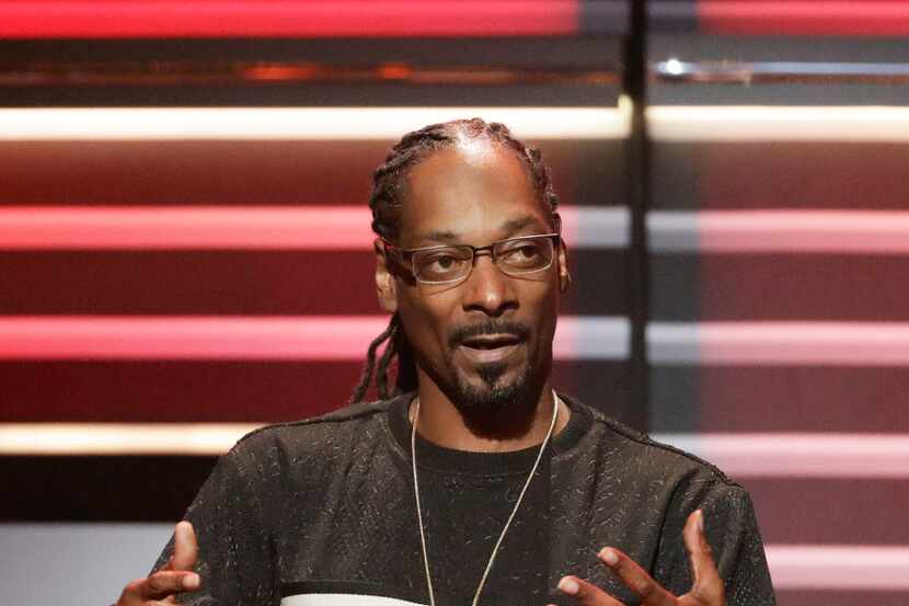 File- This Sept. 17, 2016, file photo shows Snoop Dogg speaking while being honored with the...