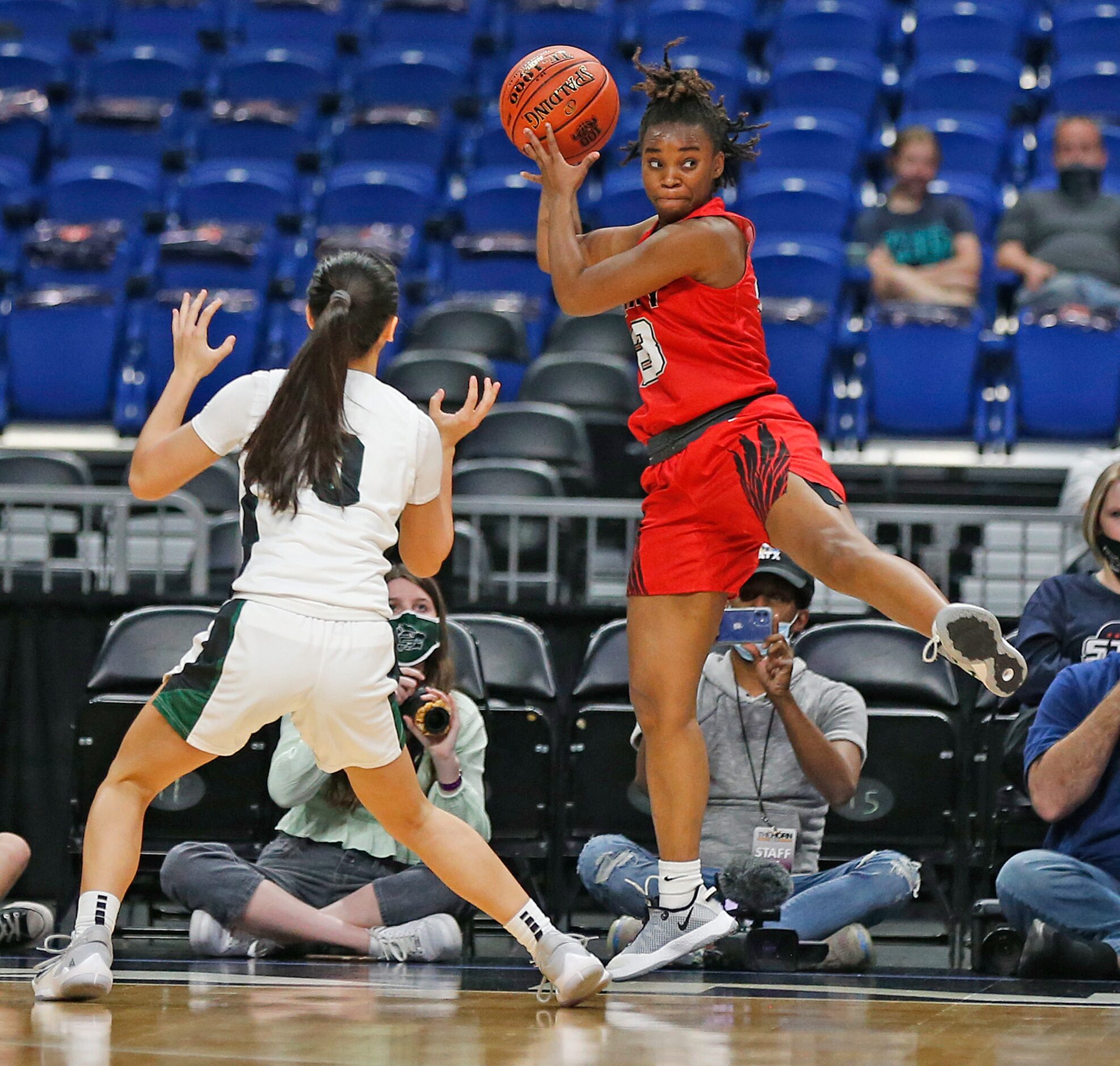 Frisco Liberty Journée Chambers #23 tries to save the ball from going out of bounds in first...