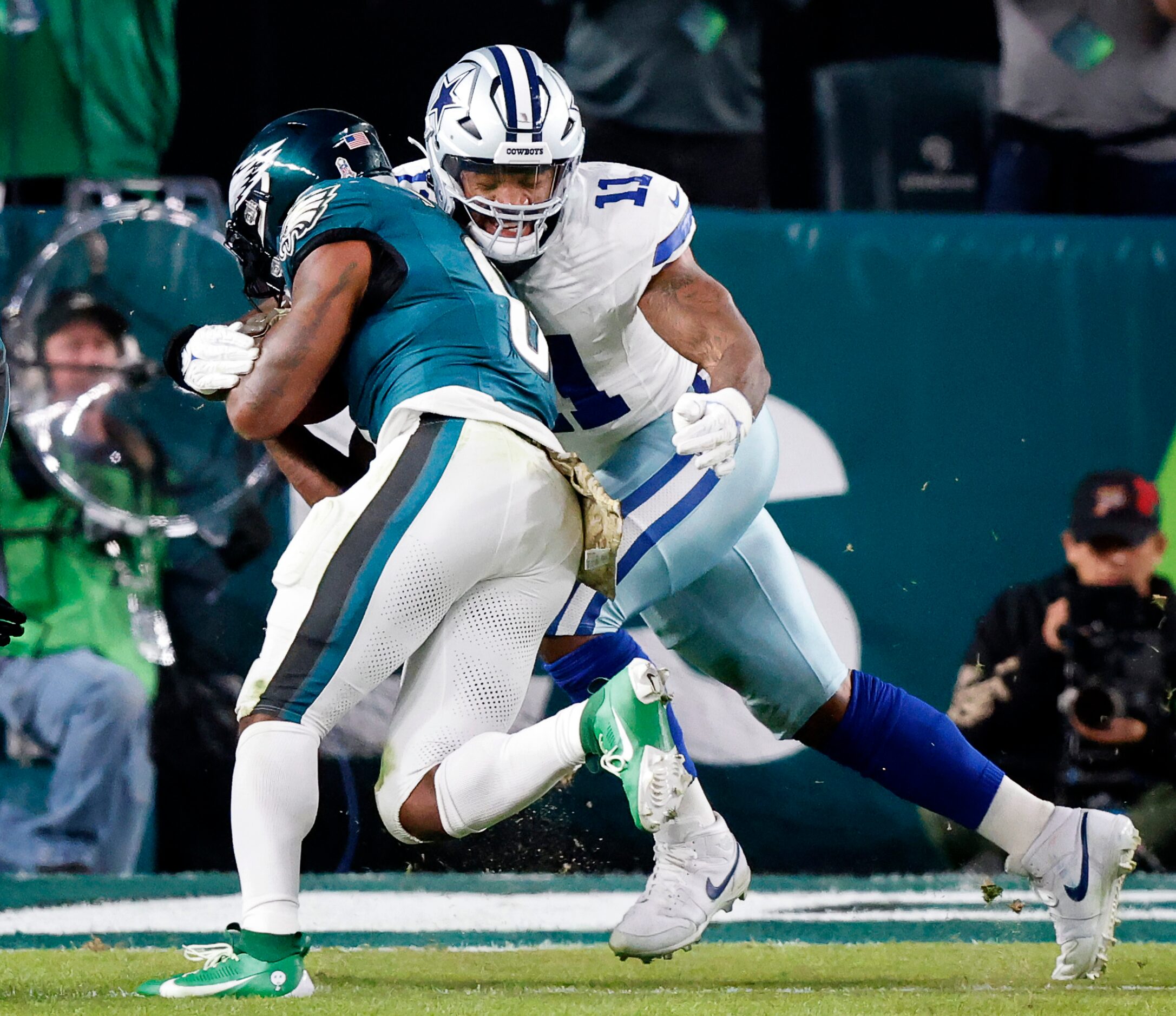 Dallas Cowboys linebacker Micah Parsons (11) stops Philadelphia Eagles running back D'Andre...