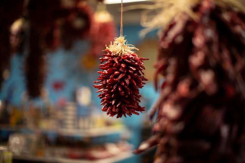 A traditional chile ristra hangs inside Chile Traditions in Albuquerque.